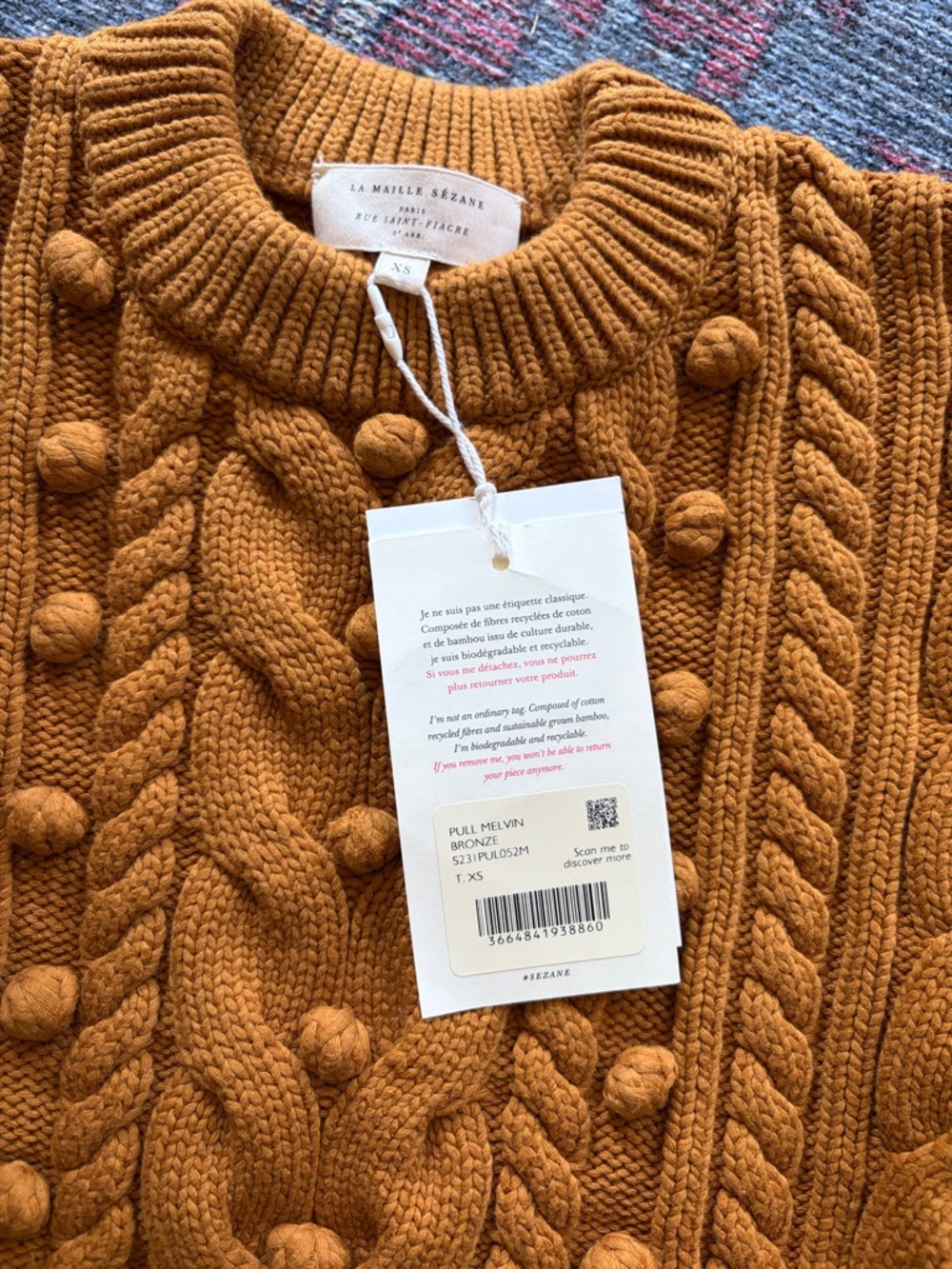 Sezane mustard cable knit sweater with pom-pom details